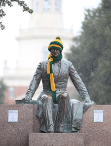 Judge Baylor statue in the snow