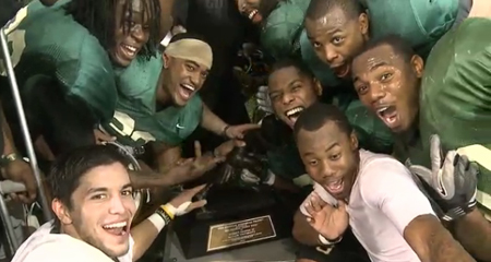 tm-heisman-dec11 Teammates with the Heisman