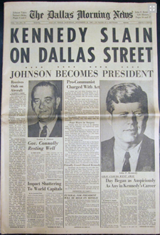 Kennedy Slain reads Dallas headline