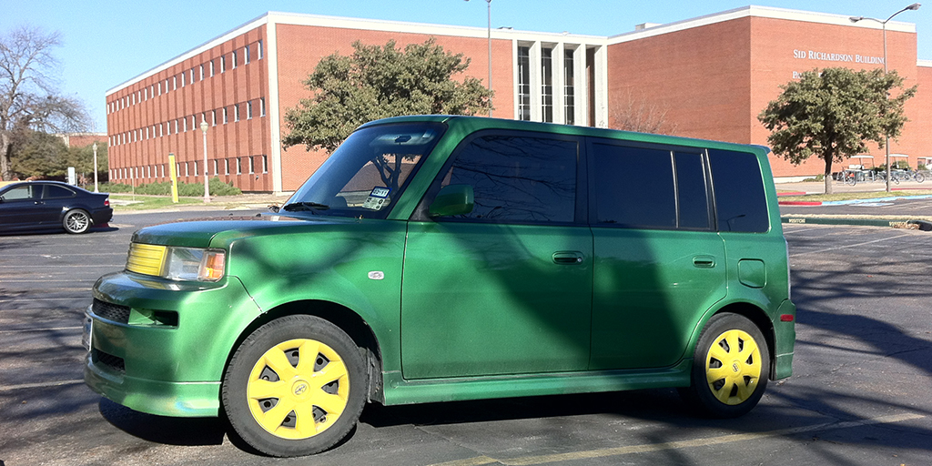 Green-and-gold Scion xB