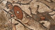 Fish swallowing soldier mosaic