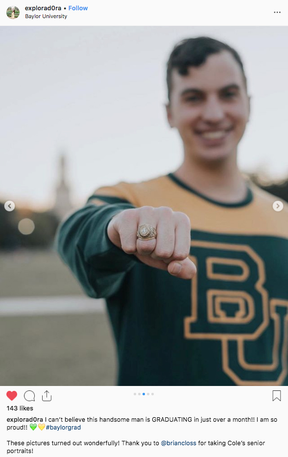 A male Baylor student showing off his Baylor ring