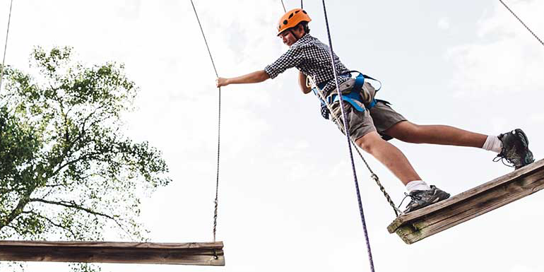 A Baylor student on the challenge course