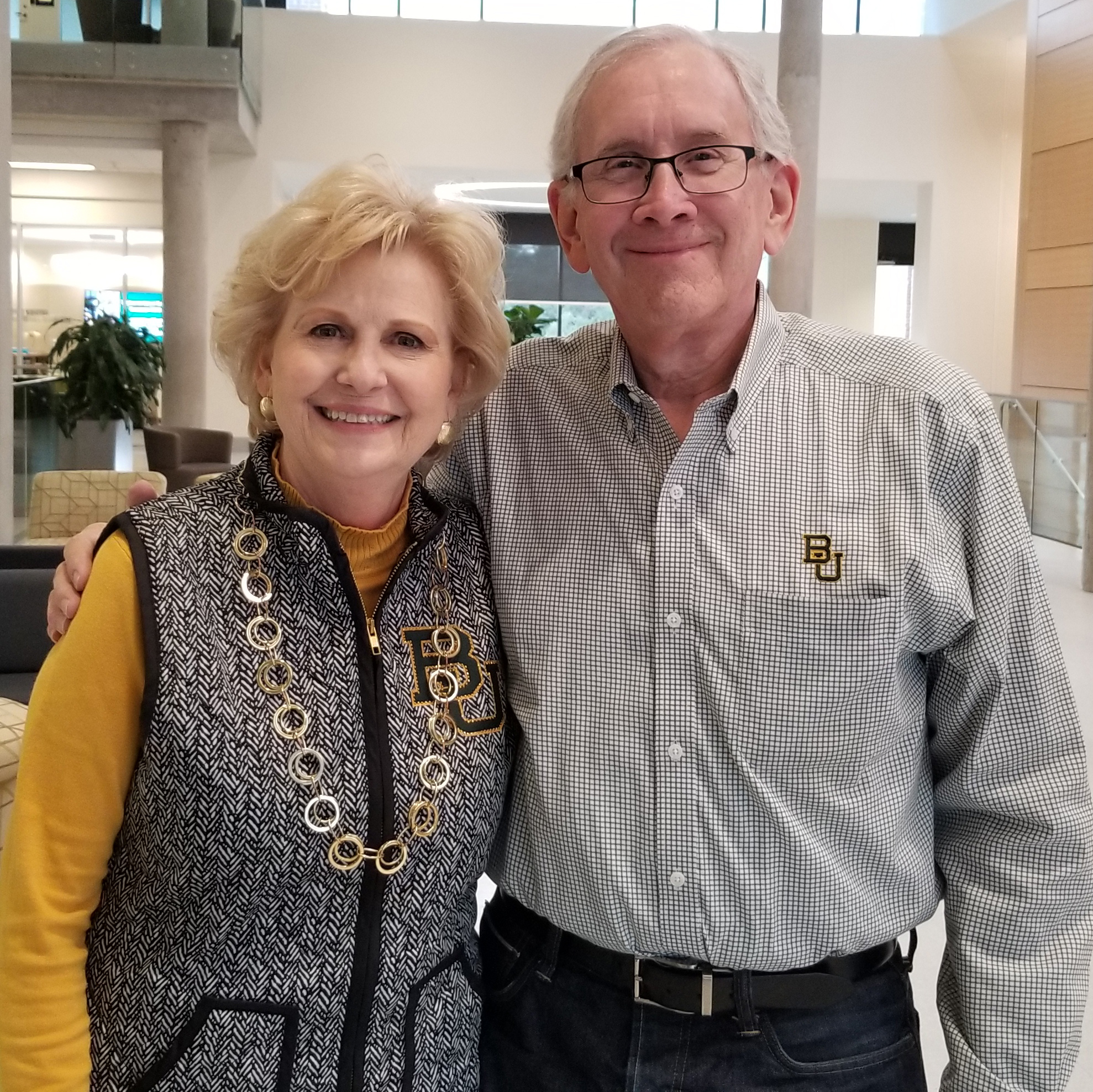 Bill and Melanie Rogers, standing inside the Foster Campus