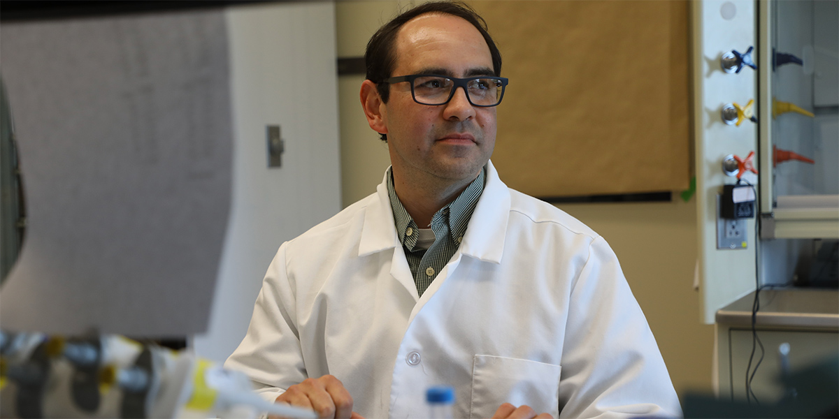 Dr. Joaquin Lugo in his lab