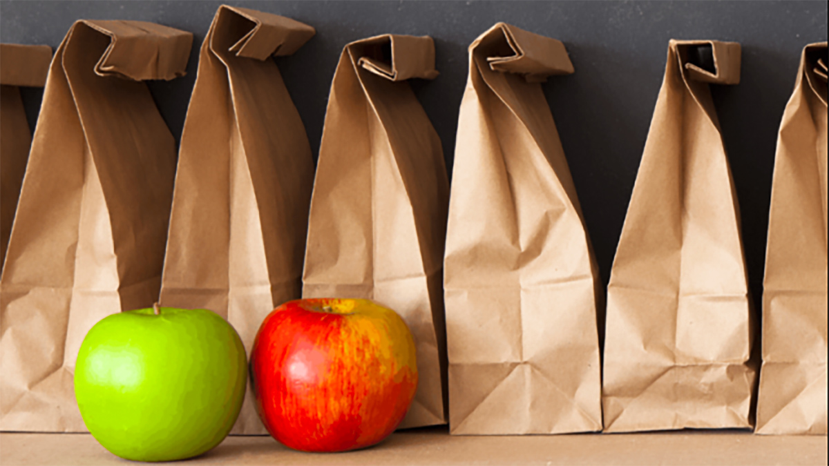 School lunch sacks in a row