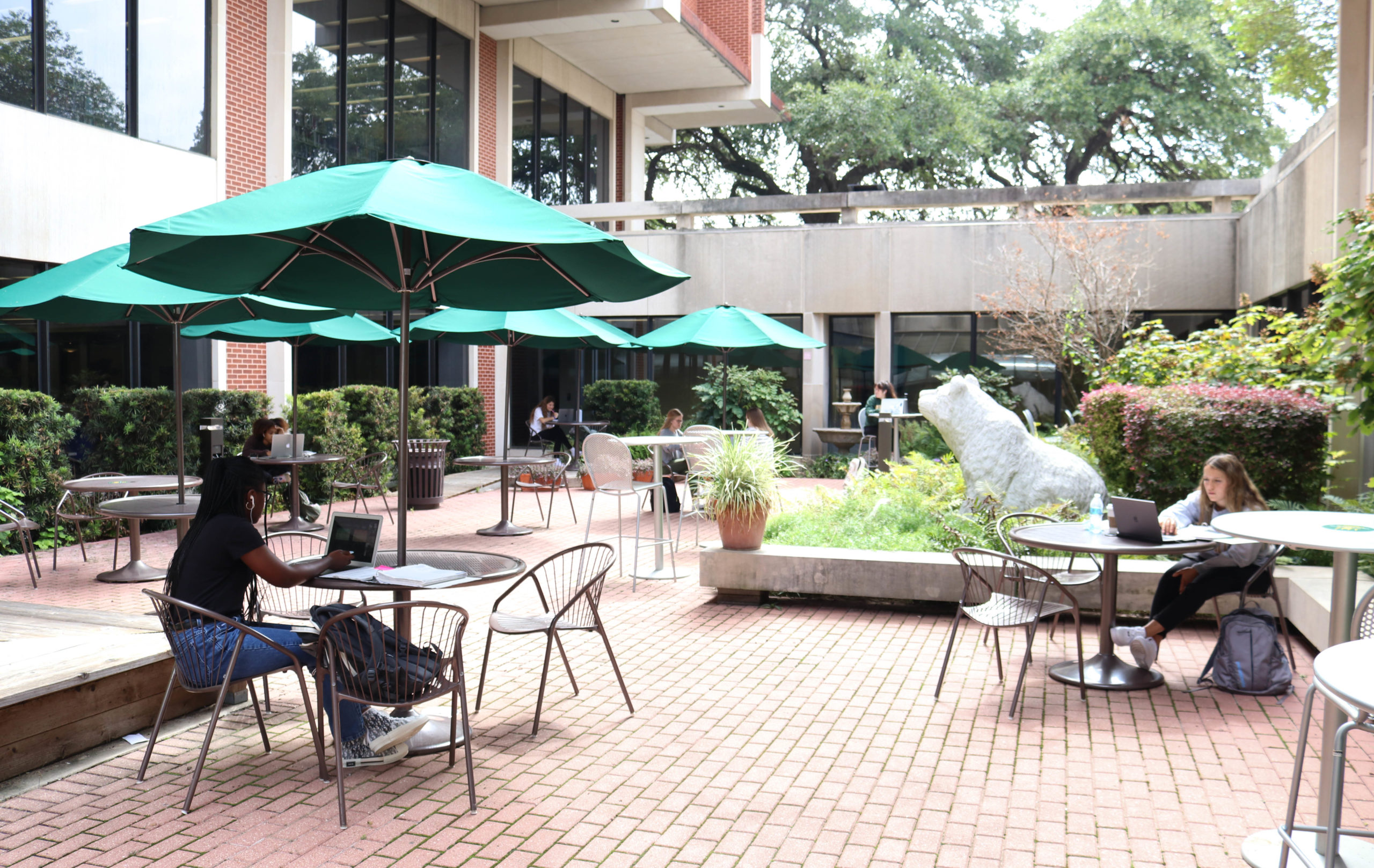 Students studying in Moody Memorial Library's Garden Level Study Commons