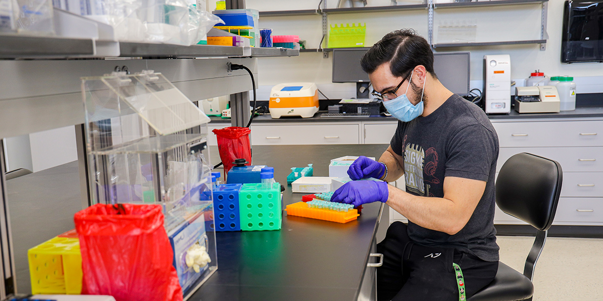 A researcher works inside the new Mooney Lab