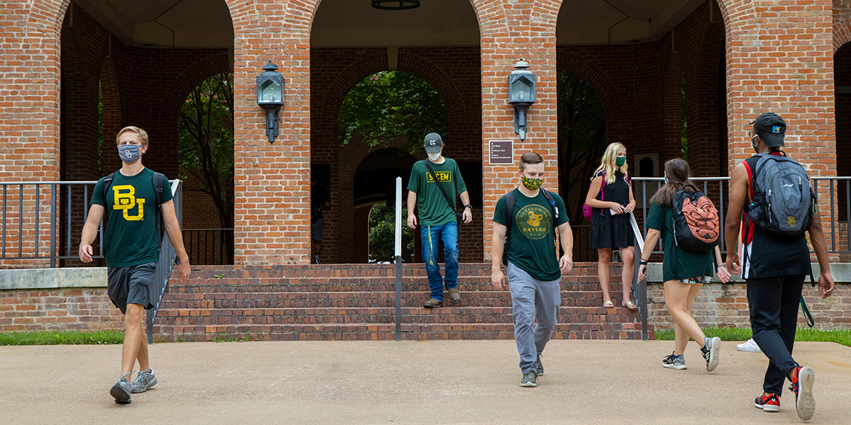 Students walking outside Draper Academic Building