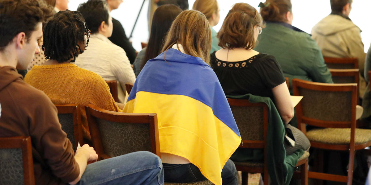 Students praying for Ukraine in Elliston Chapel