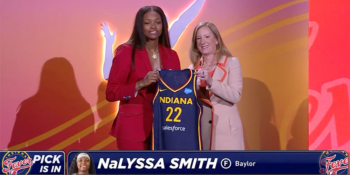 NaLyssa Smith on stage at the WNBA draft after being selected No. 2 overall