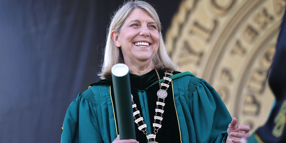 President Livingstone smiles at Commencement -- May 2021