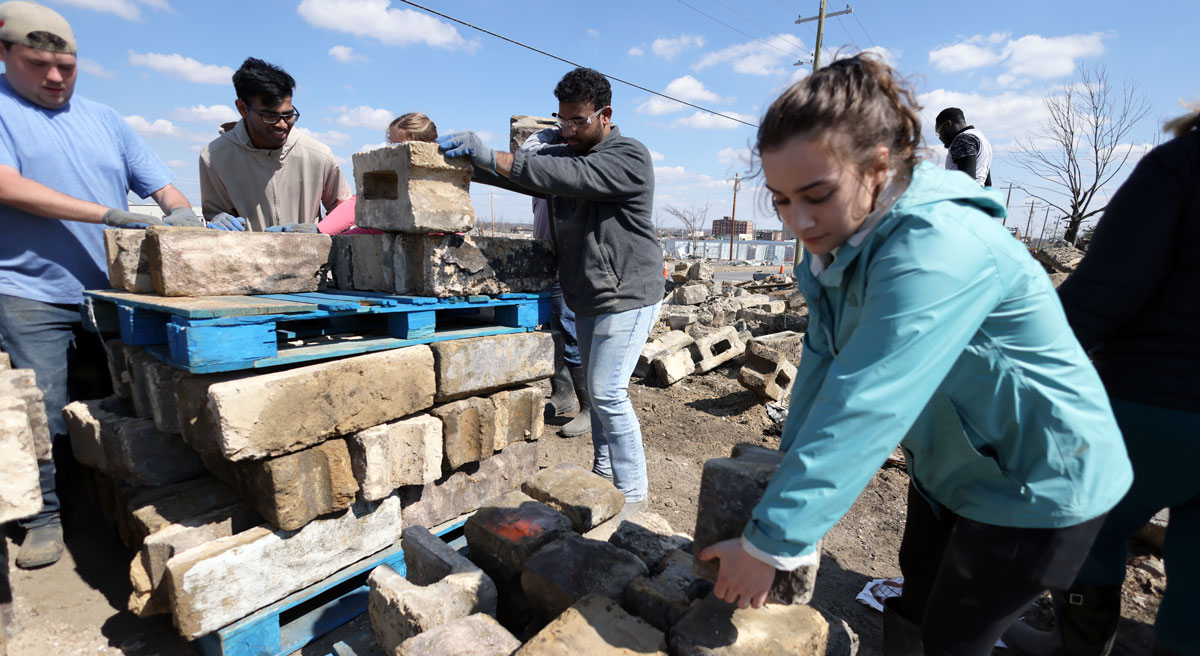 Baylor students doing tornado damage clean-up in Kentucky with BU Missions