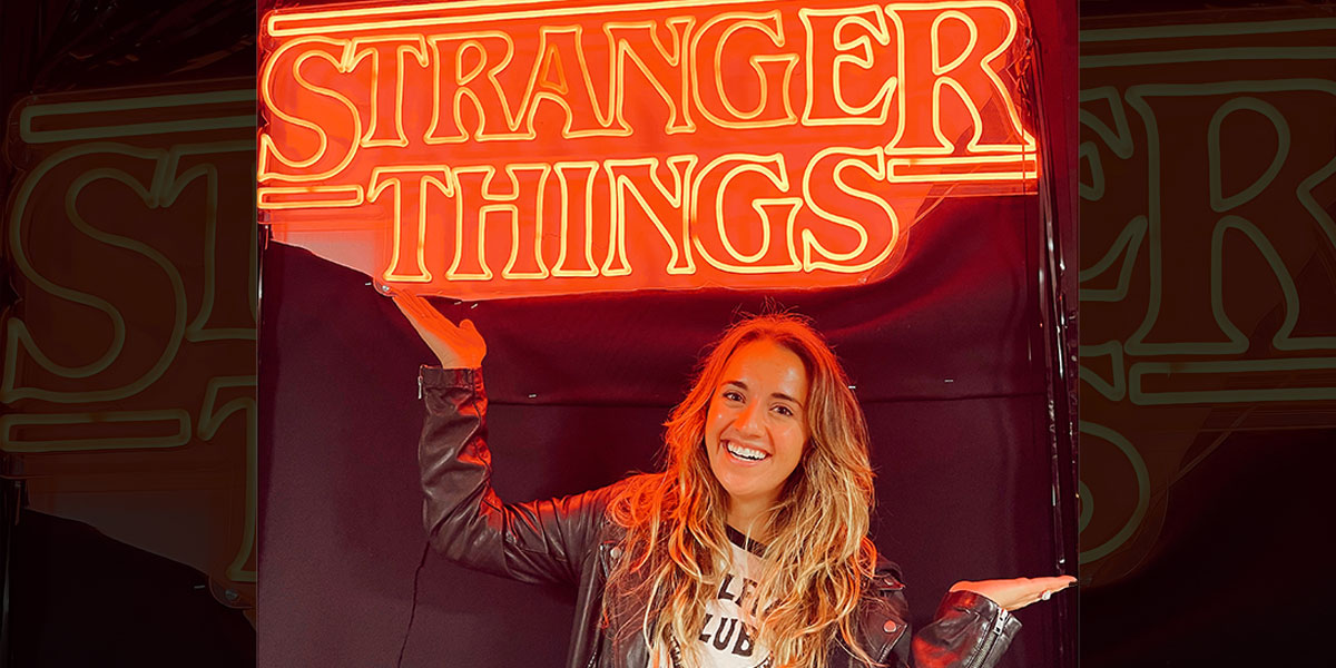 Madison Martin poses with a Stranger Things sign