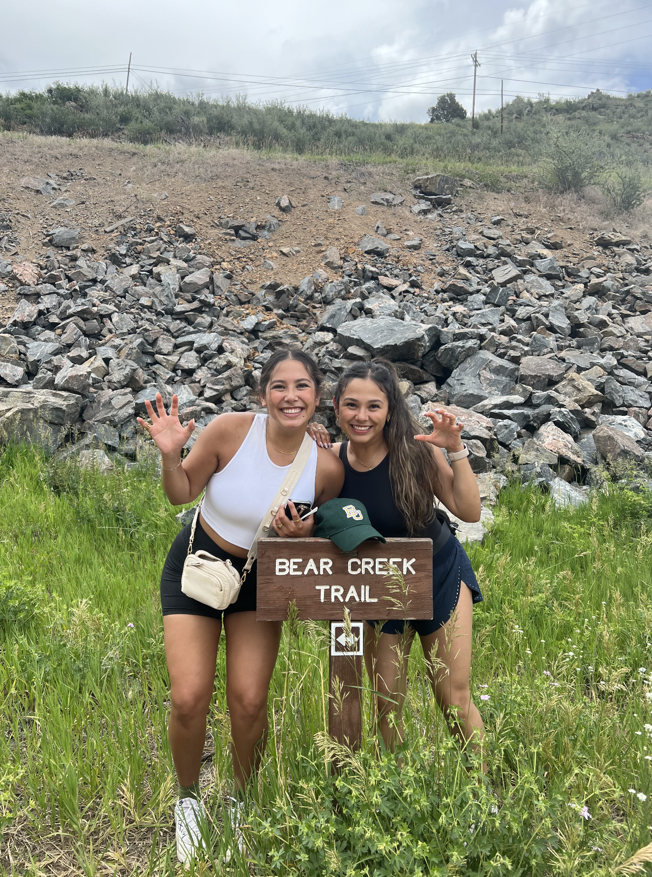 Two girls do a "sic 'em" at "Bear Creek Trail"