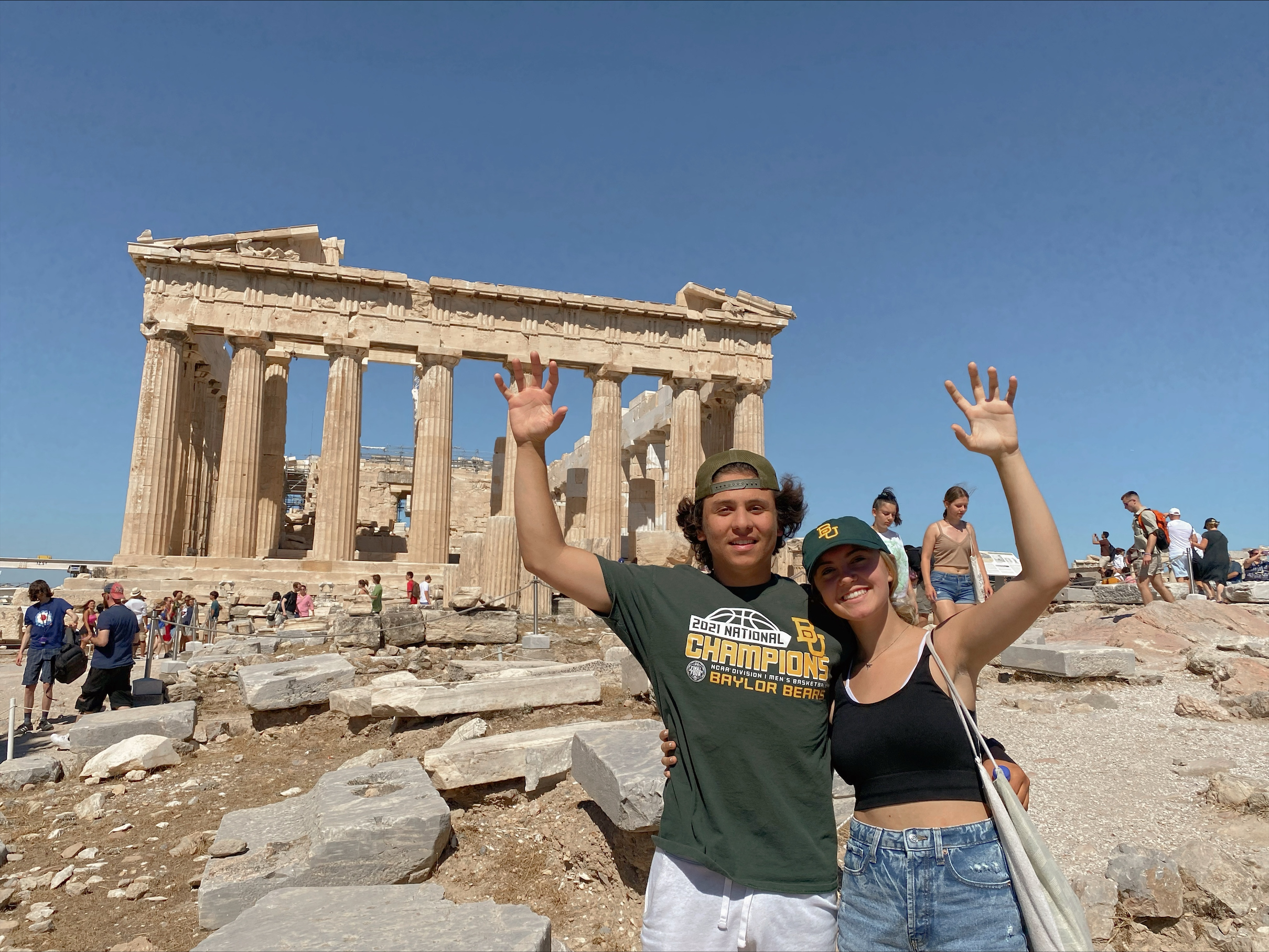 Two Baylor students outside ruins in Greece