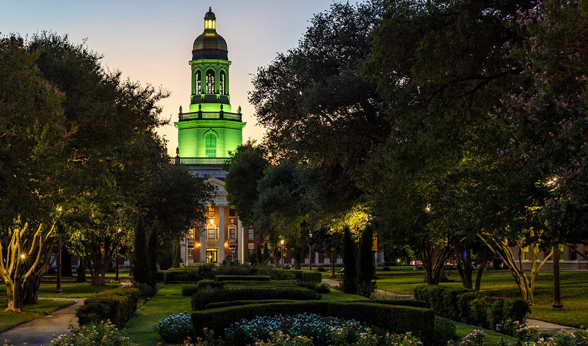 Pat Neff Hall shining green thanks to new LED lights