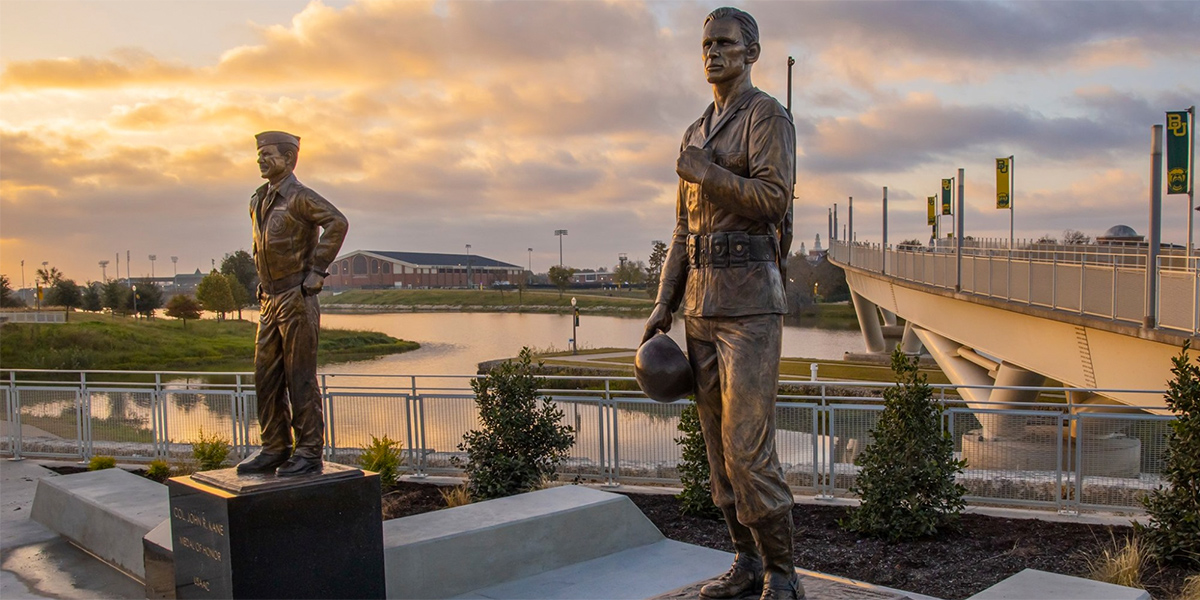Kane and Lummus statues outside McLane Stadium