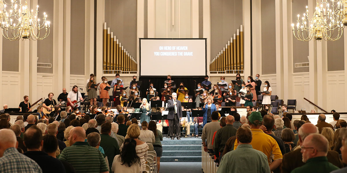 Worship service with singers and musicians