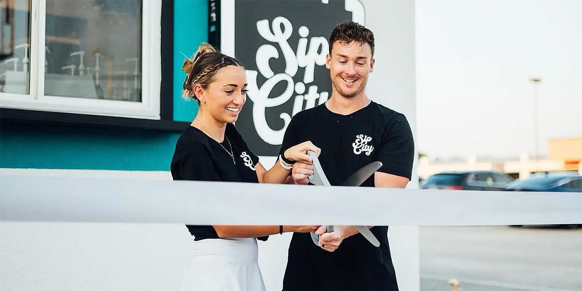 Brooklyn and husband Dakota cut the ribbon on Sip City