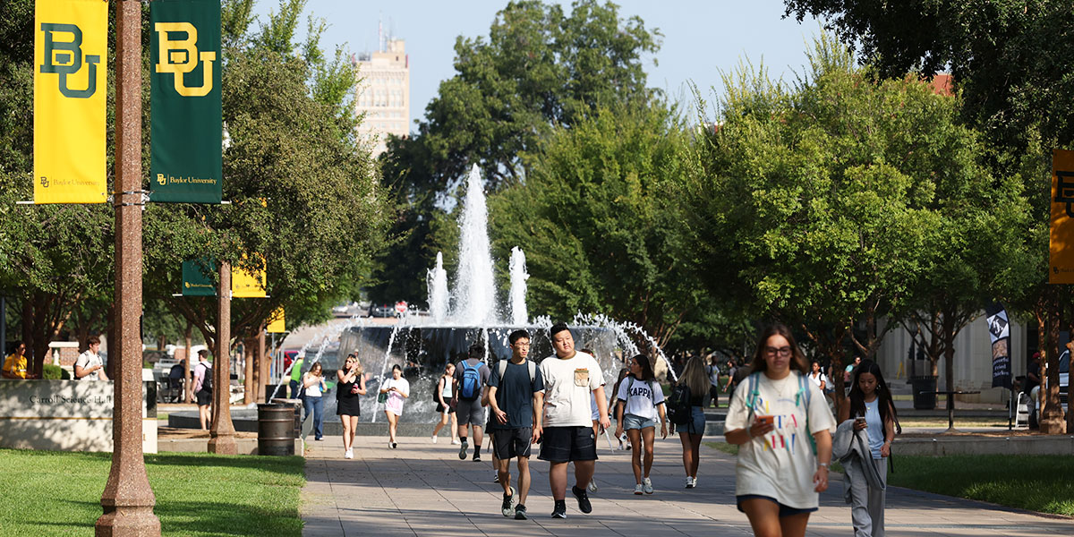 Baylor students walk along 5th Street