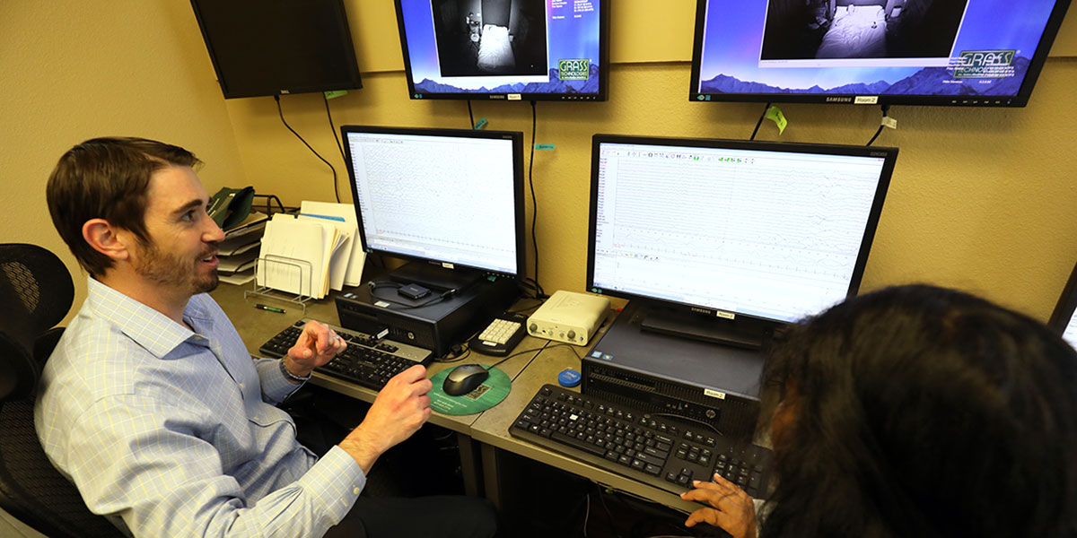 Dr. Michael Scullin working a sleep study