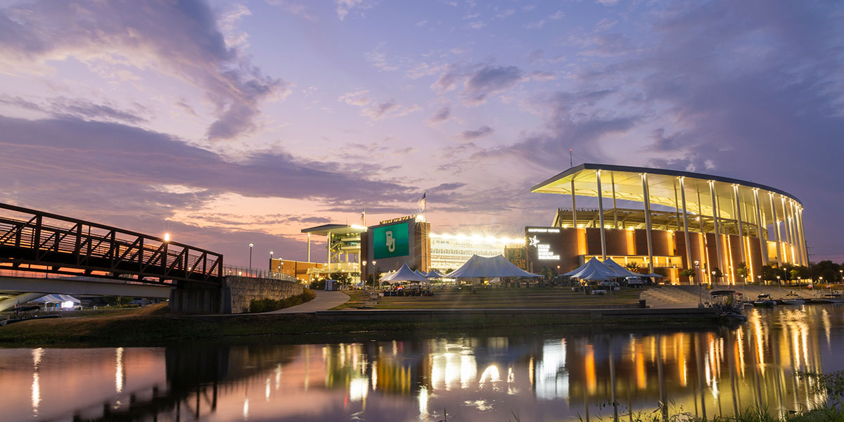 McLane Stadium exterior at sunset