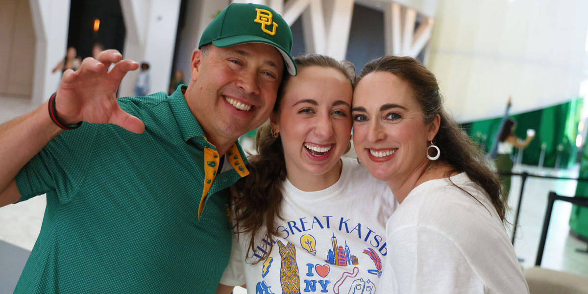 Visitors do a sic 'em during Homecoming at the Hurd