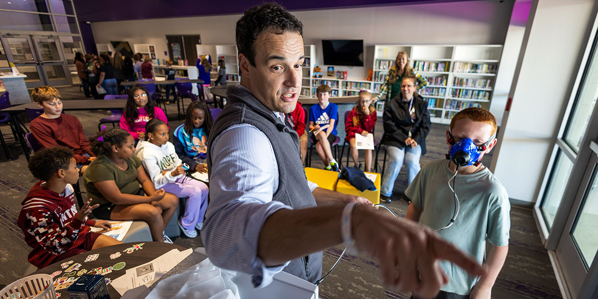 Dr. Sam Urlacher teaches kids at Mart Elementary School