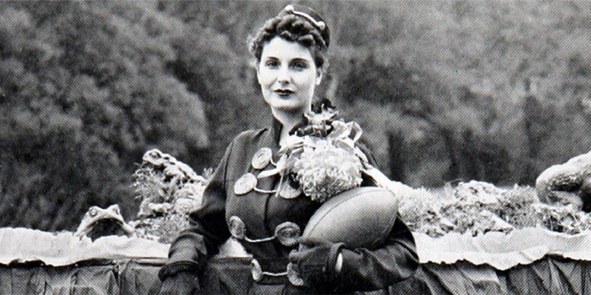 1935 Baylor Homecoming Queen Marguerite Joyce wearing a mum